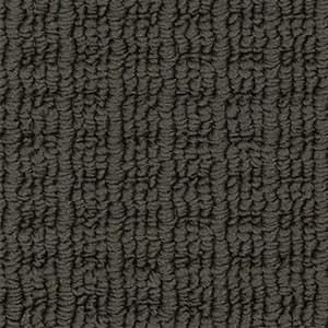 A close up of a gray carpet texture.