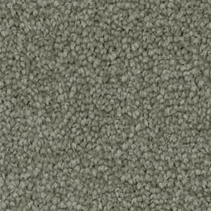 A close up of a gray carpet texture.