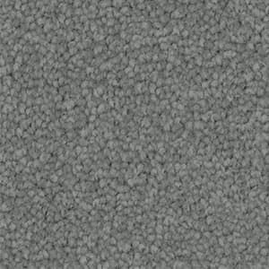 A close up of a gray carpet texture.