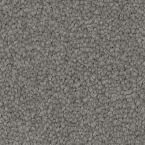 A close up of a gray carpet texture.