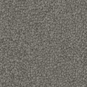 A close up of a gray carpet texture.