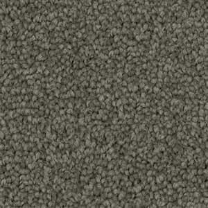 A close up of a gray carpet texture.