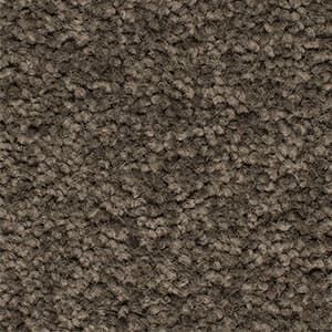 A close up of a brown carpet texture.