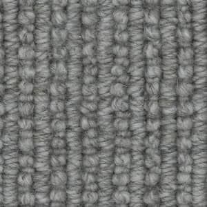 A close up of a gray carpet texture.