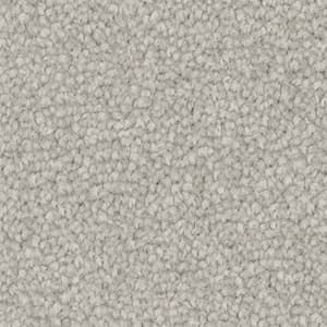 A close up of a white carpet texture.