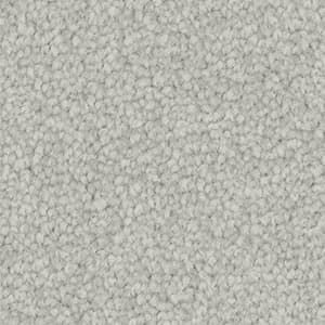 A close up of a white carpet texture.