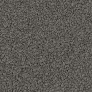 A close up of a gray carpet texture.