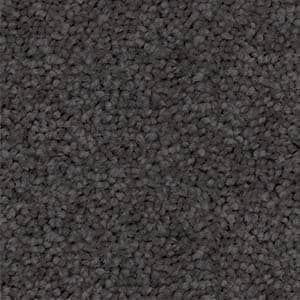 A close up of a gray carpet texture.