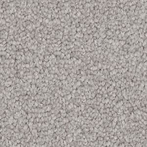 A close up of a gray carpet texture.