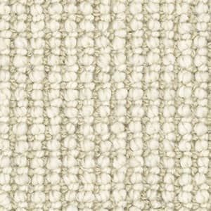 A close up of a white carpet with a striped pattern.