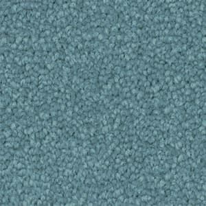 A close up of a light blue carpet triexta texture.