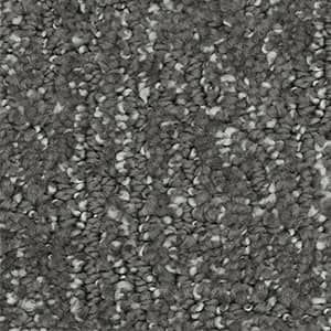 A close up of a gray carpet texture.