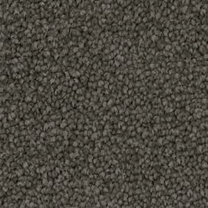 A close up of a gray carpet texture.