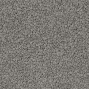 A close up of a gray carpet texture.