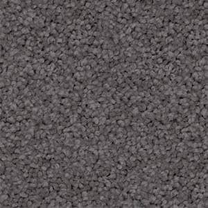A close up of a gray carpet texture.