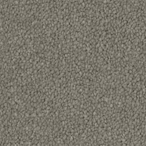 A close up of a gray carpet texture.
