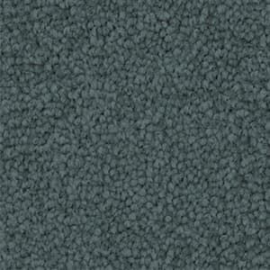 A close up of a gray carpet texture.