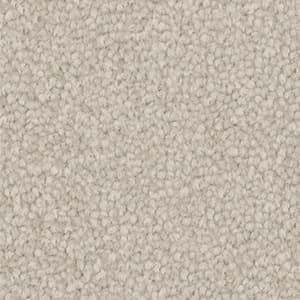 A close up of a white carpet texture.