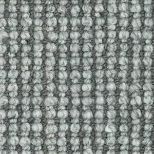 A close up of a gray carpet with a striped pattern.