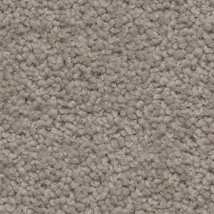 A close up of a carpet texture in a gray color.