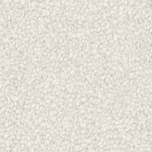 A close up of a white carpet texture.