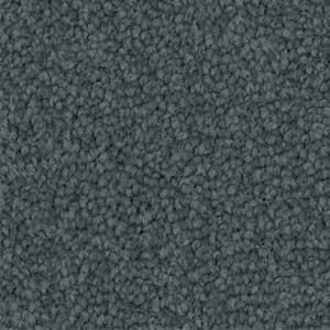 A close up of a gray carpet texture.