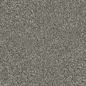 A close up of a gray carpet texture.