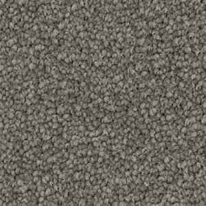 A close up of a gray carpet texture.