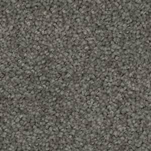 A close up of a gray carpet texture.