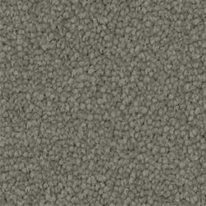 A close up of a gray carpet texture.