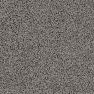 A close up of a gray carpet texture.