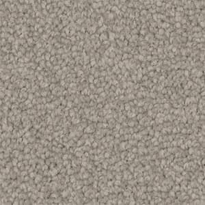 A close up of a gray carpet texture.