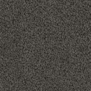 A close up of a gray carpet texture.