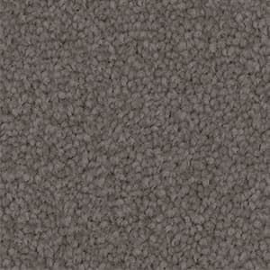 A close up of a gray carpet texture.