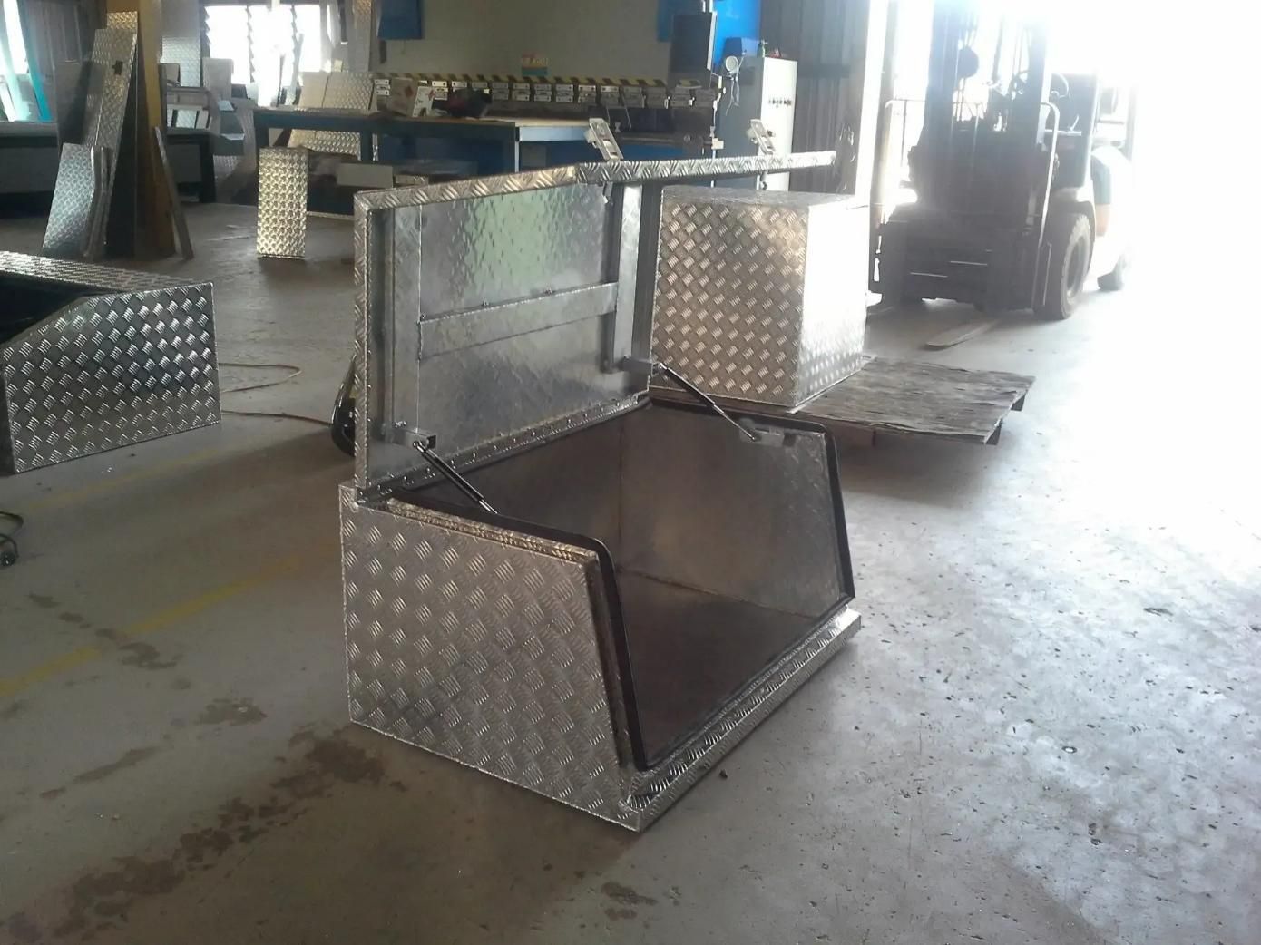 A Metal Box with The Lid Open Is Sitting on The Floor — MBB Toolbox In Winnellie, NT