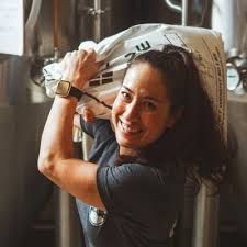 Photo of a woman working in a brewery