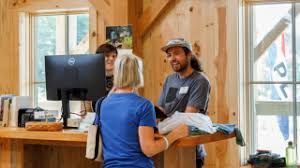 Photo of a woman checking out at a store