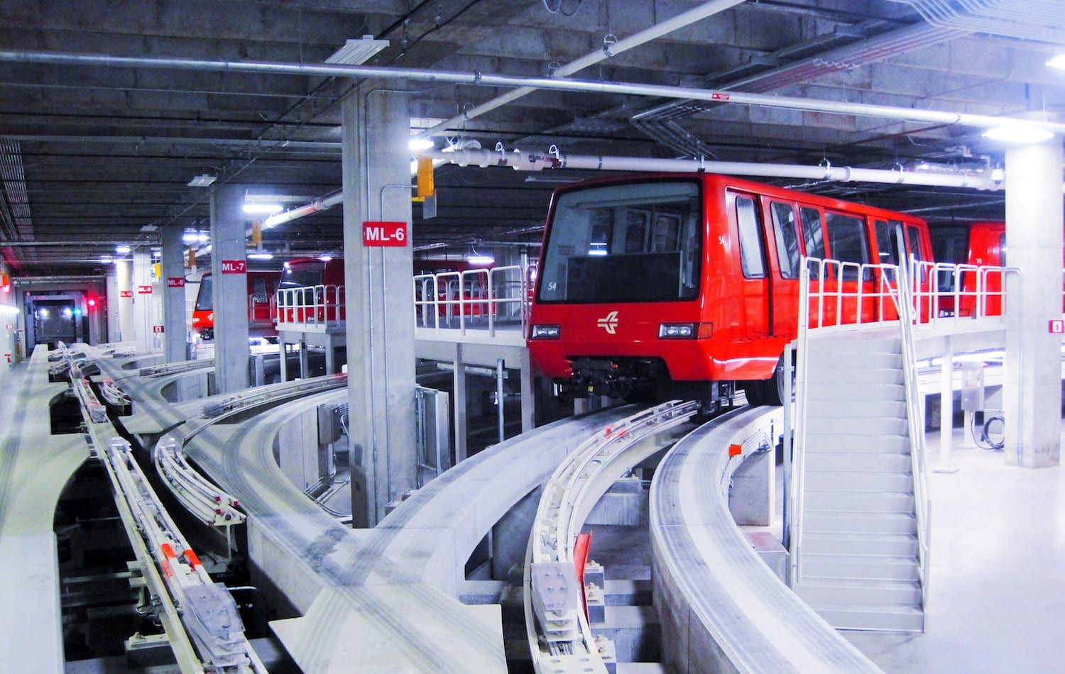Automatic guideway traction system