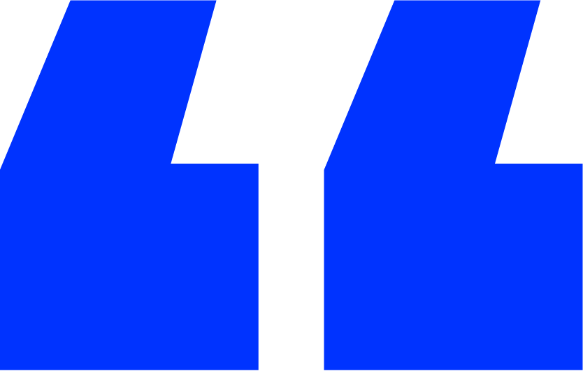 A blue and white quotation mark on a white background.