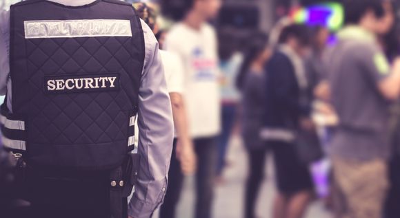 Security man standing indoor