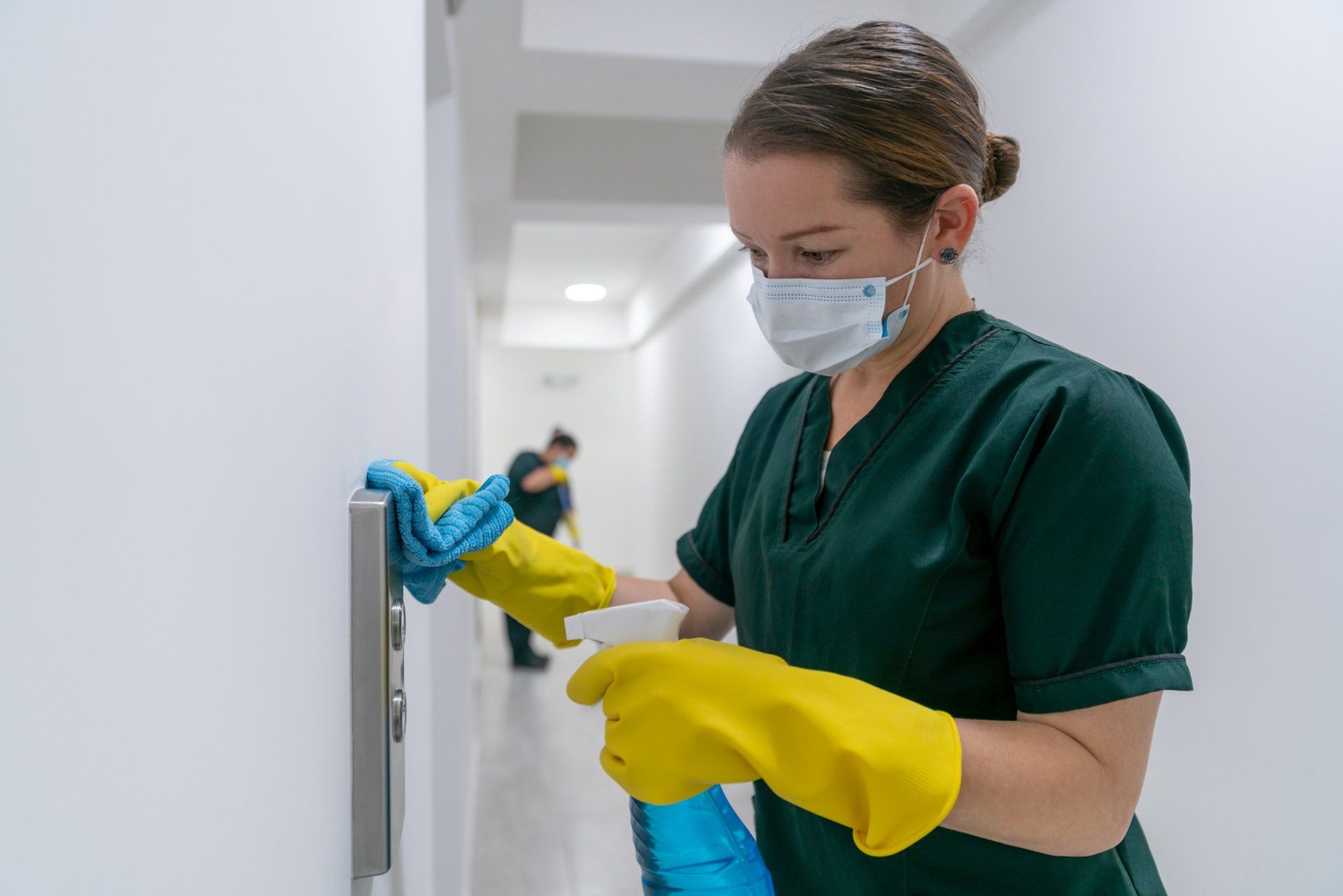 Woman Cleaning Hospital - Camarillo, CA - The Premier Cleaning Service Inc