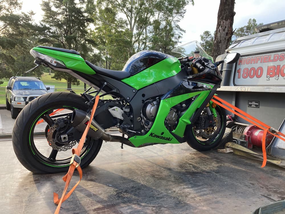 Neon Green Motorbike on Tow Truck —  Highfields Towing in Highfields, QLD