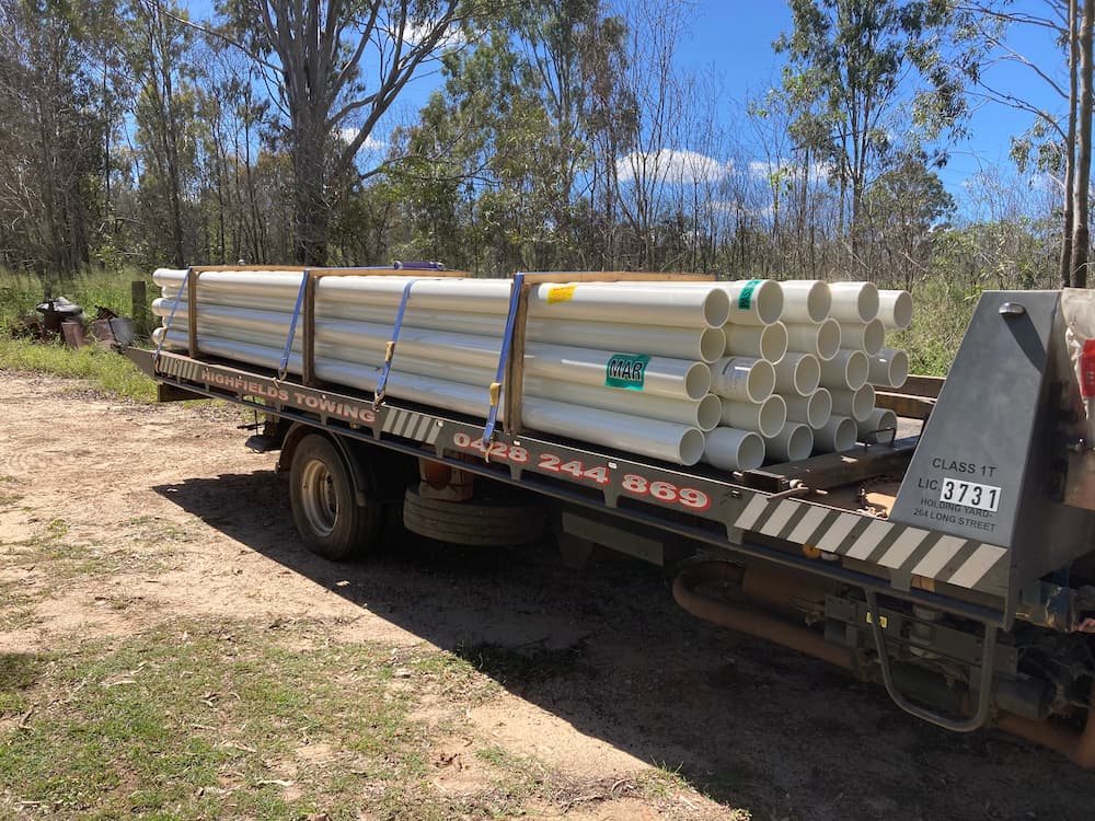 Plastic Pipes is being Transported by a Truck —  Highfields Towing in Highfields, QLD