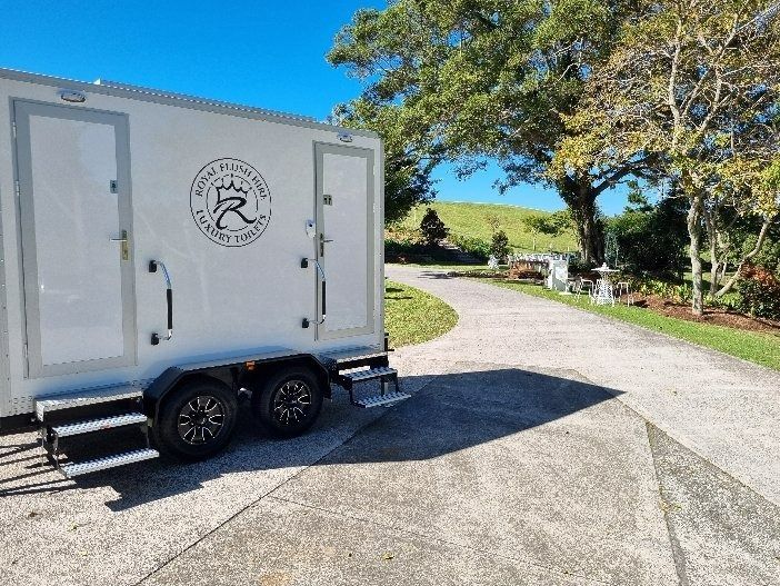 White Portable Restroom Trailer — Royal Flush Luxury Toilet, Portaloo & Shower Hire in Hervey Bay, QLD