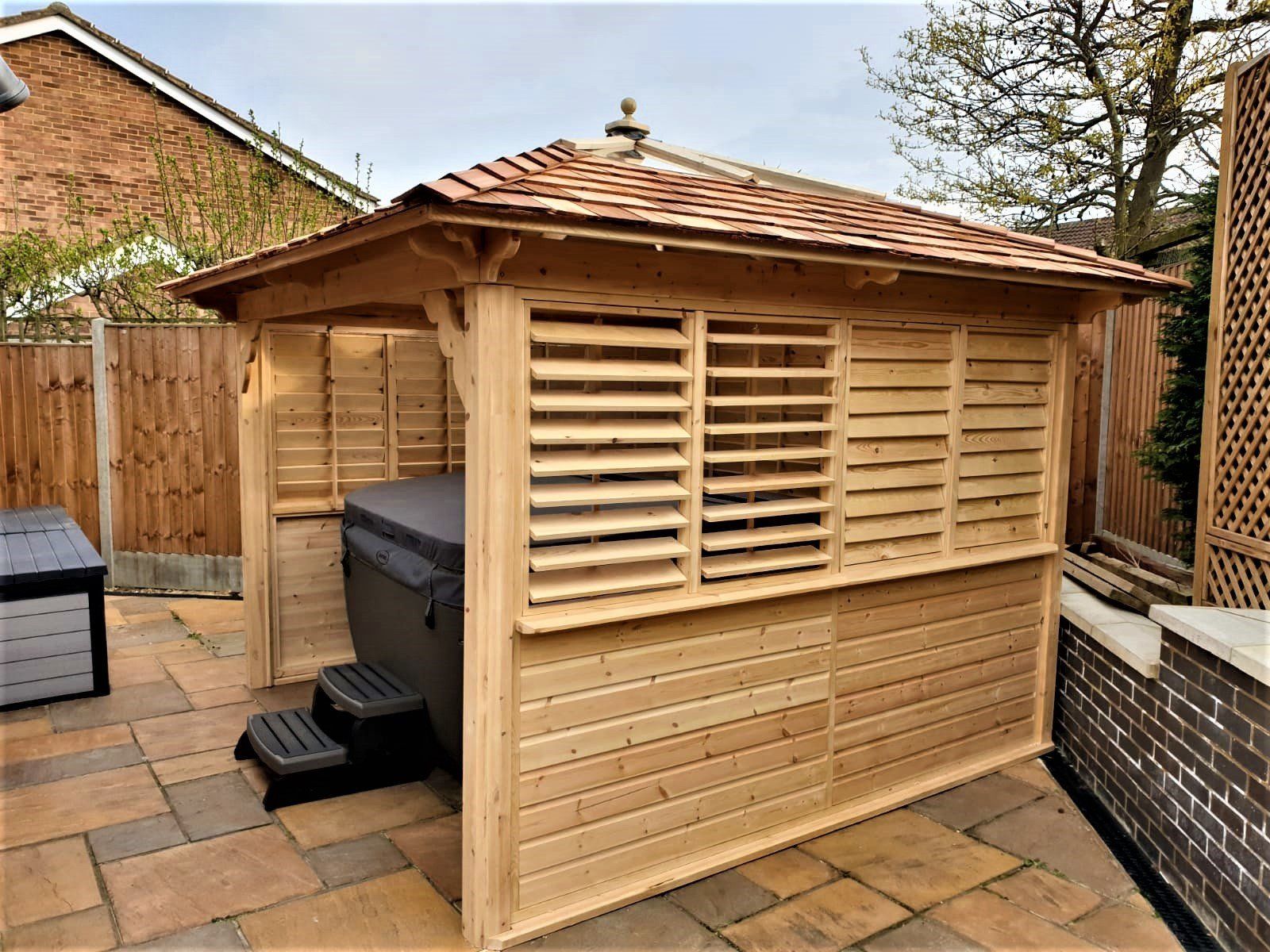 gazebo with side louvres and shingle roof by Hot Tub Haven