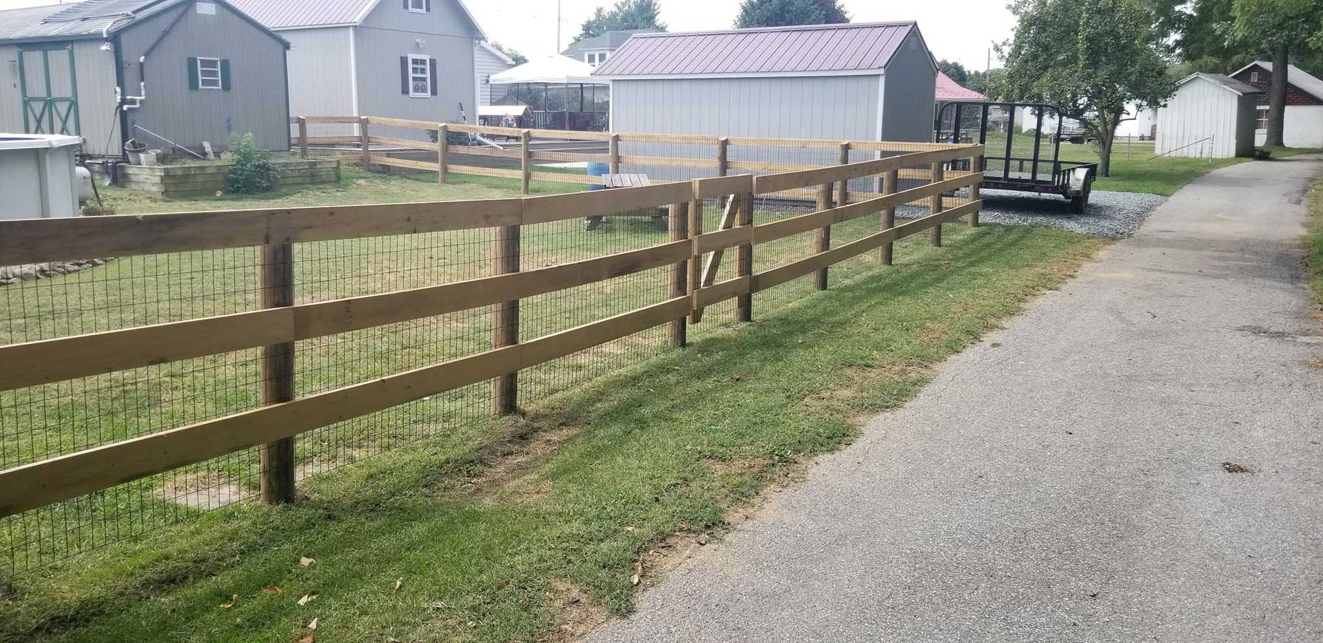 Wood fences with metal screen — Shippensburg, PA — Nealy Fence