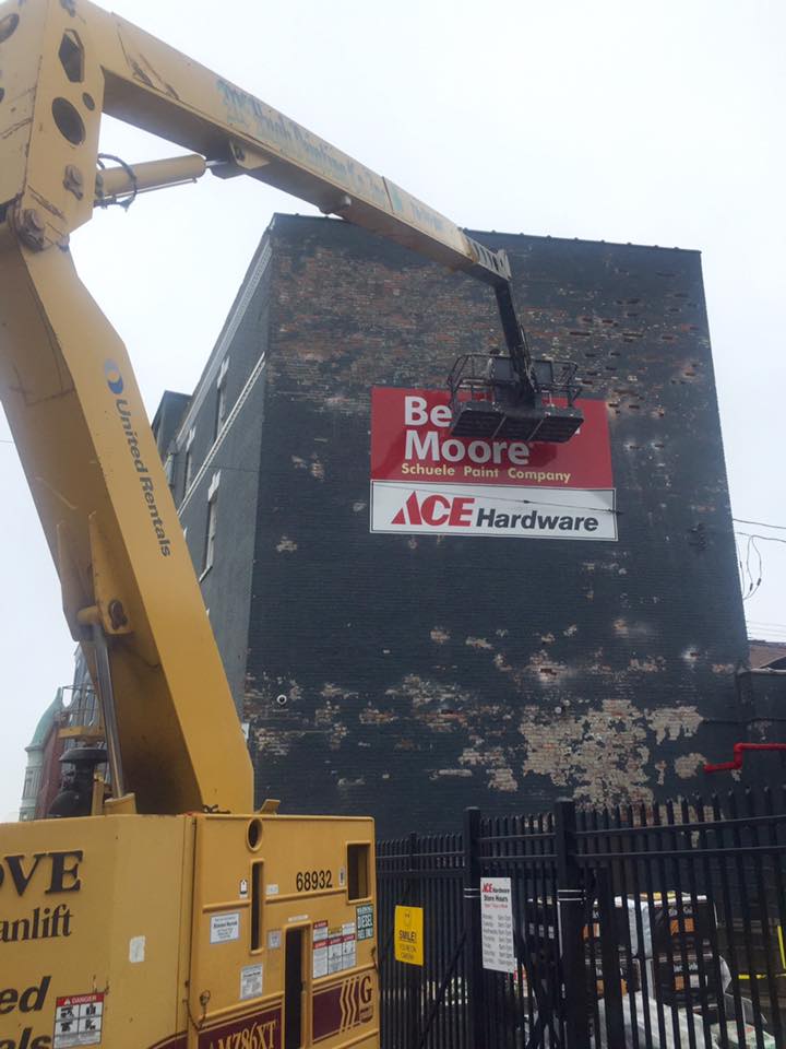 fixing spots on side of tall building