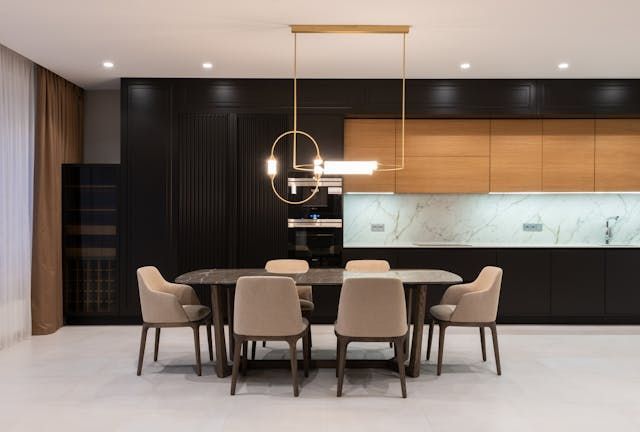 dining room table and room with black and wooden accents