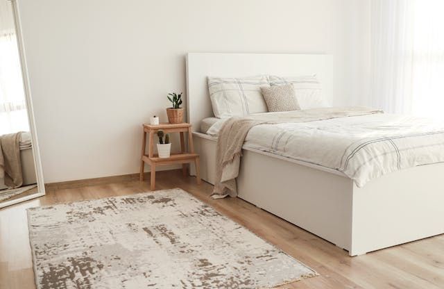 cream coloured and wood bedroom