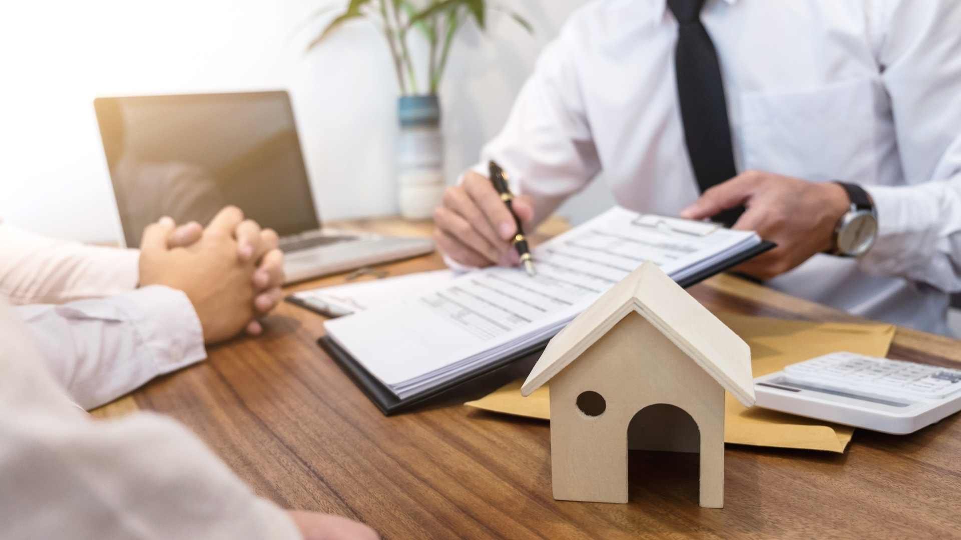 two people going over a rental legal document